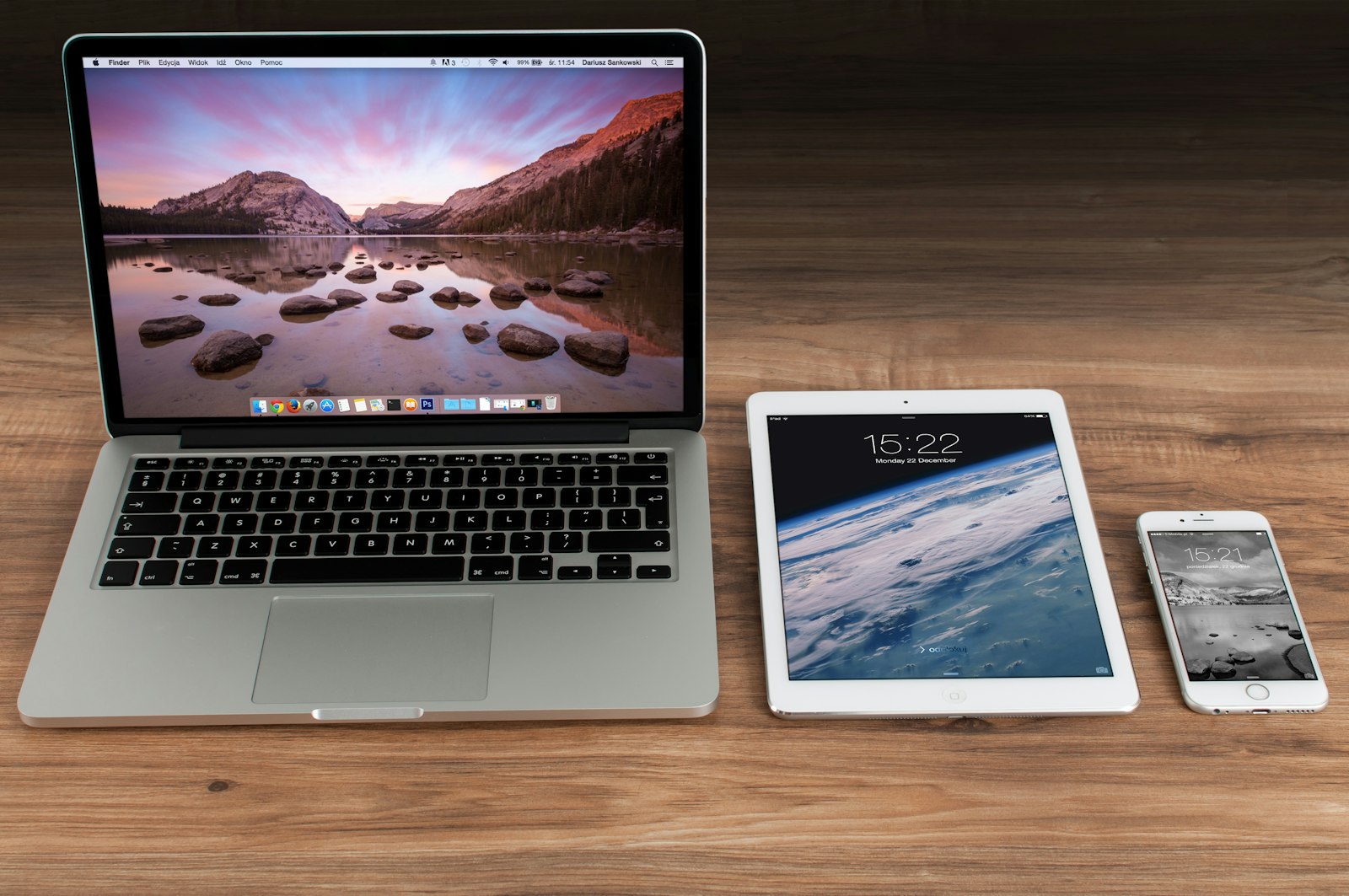 Laptop, tablet and phone showing digital website layouts